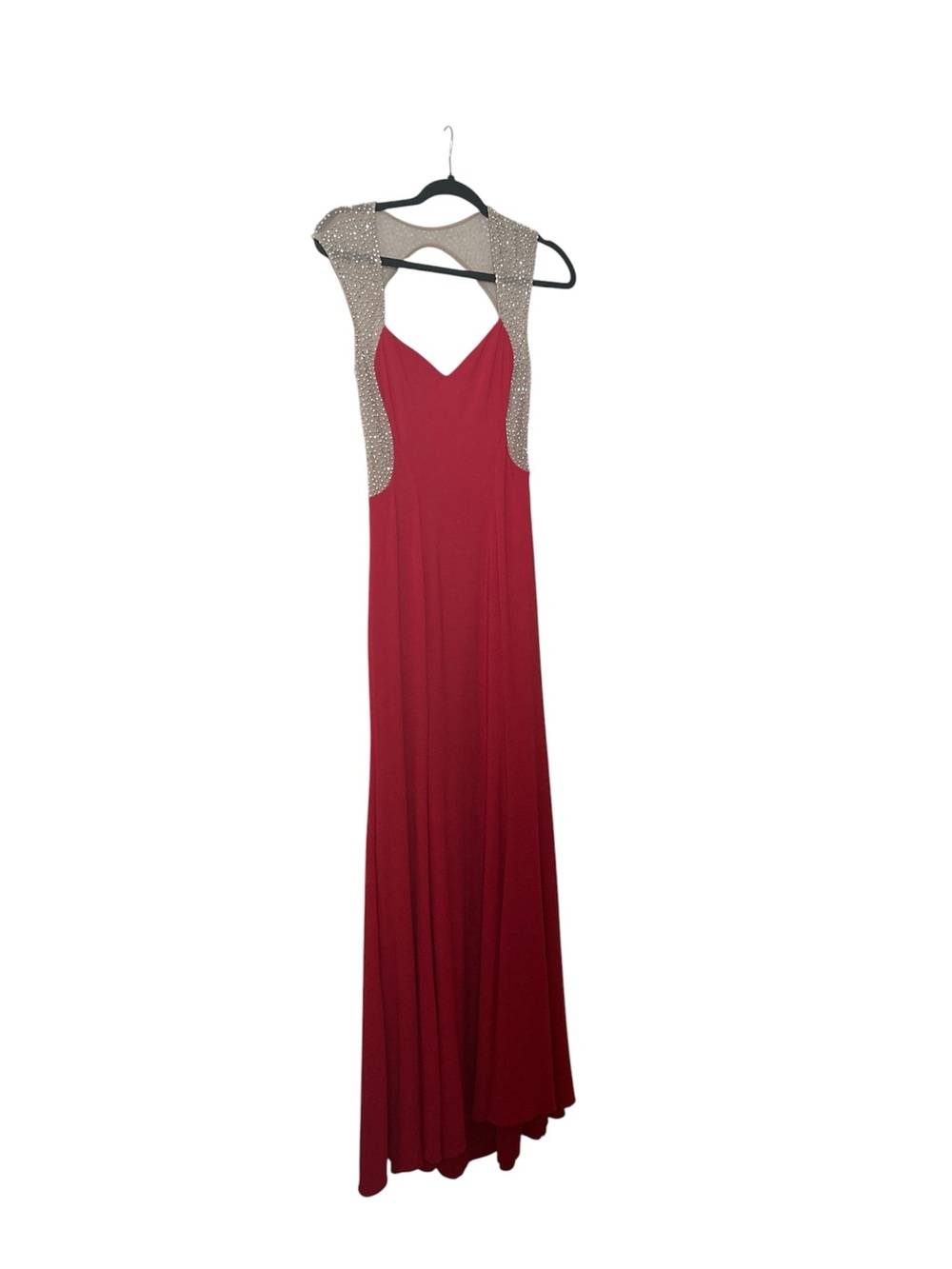 Lady in Red Evening Gown with Embellished Shoulders
